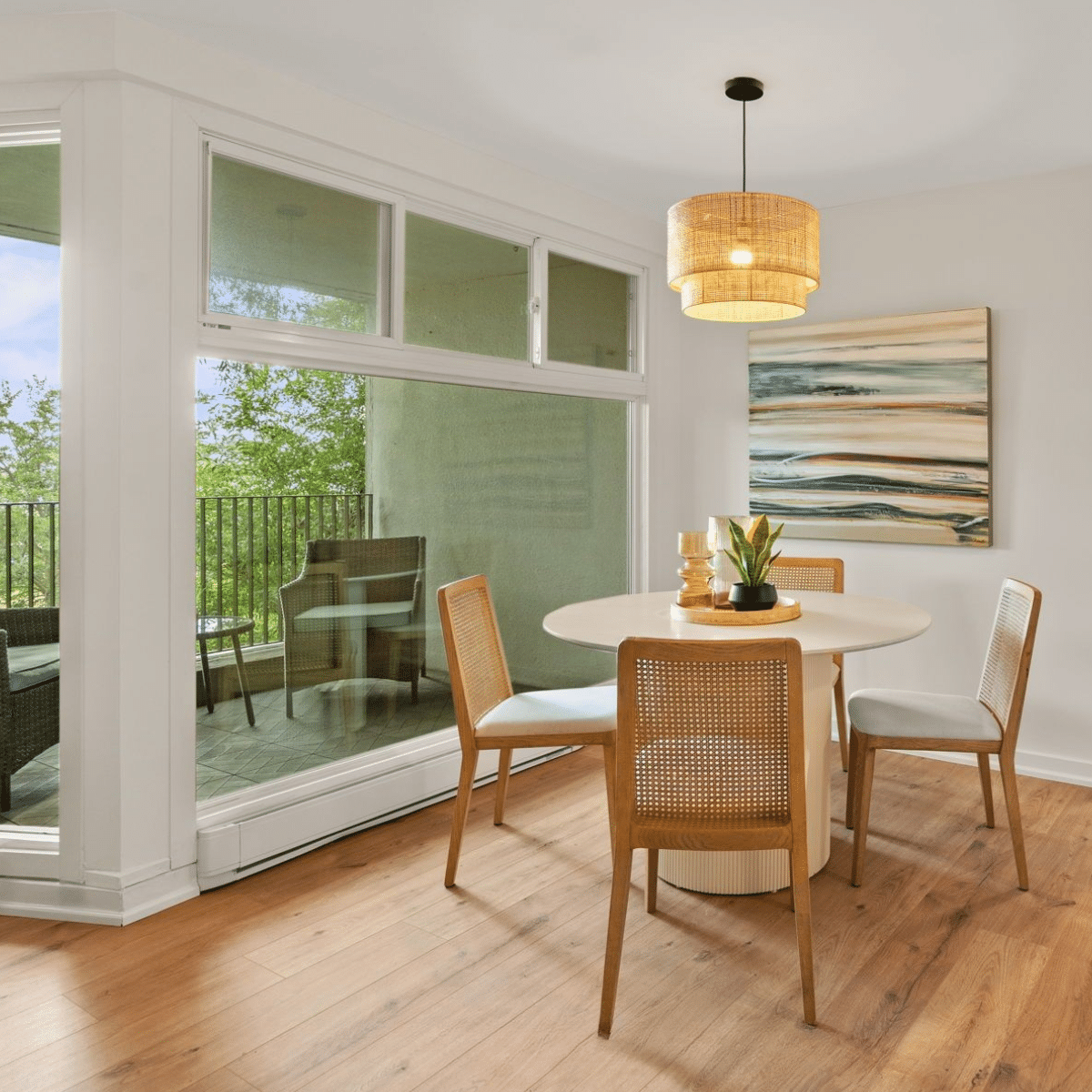 Beaches condo co-op dining room styled with natural cane dining chairs