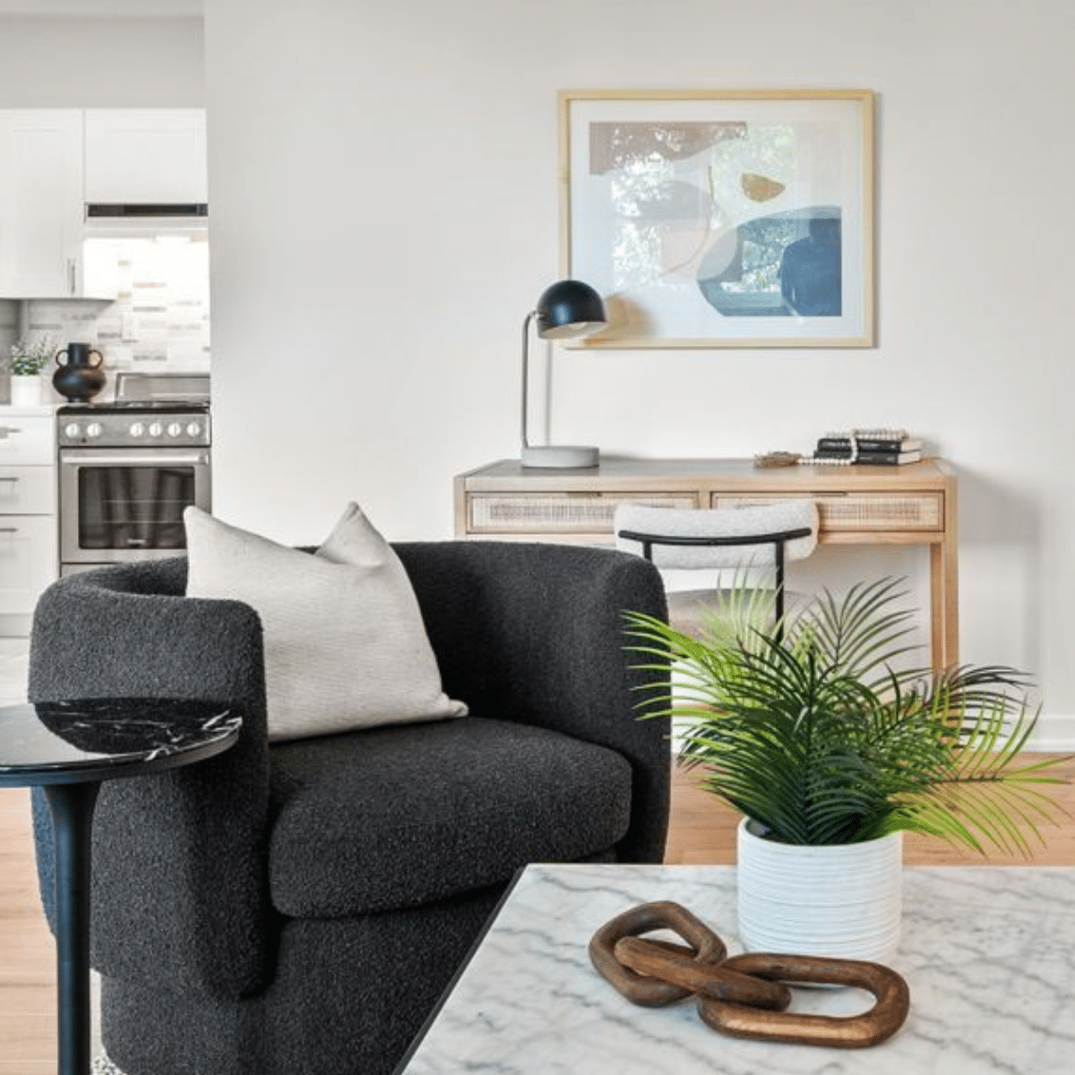 Beaches condo co-op home office staged with desk, art and lamp