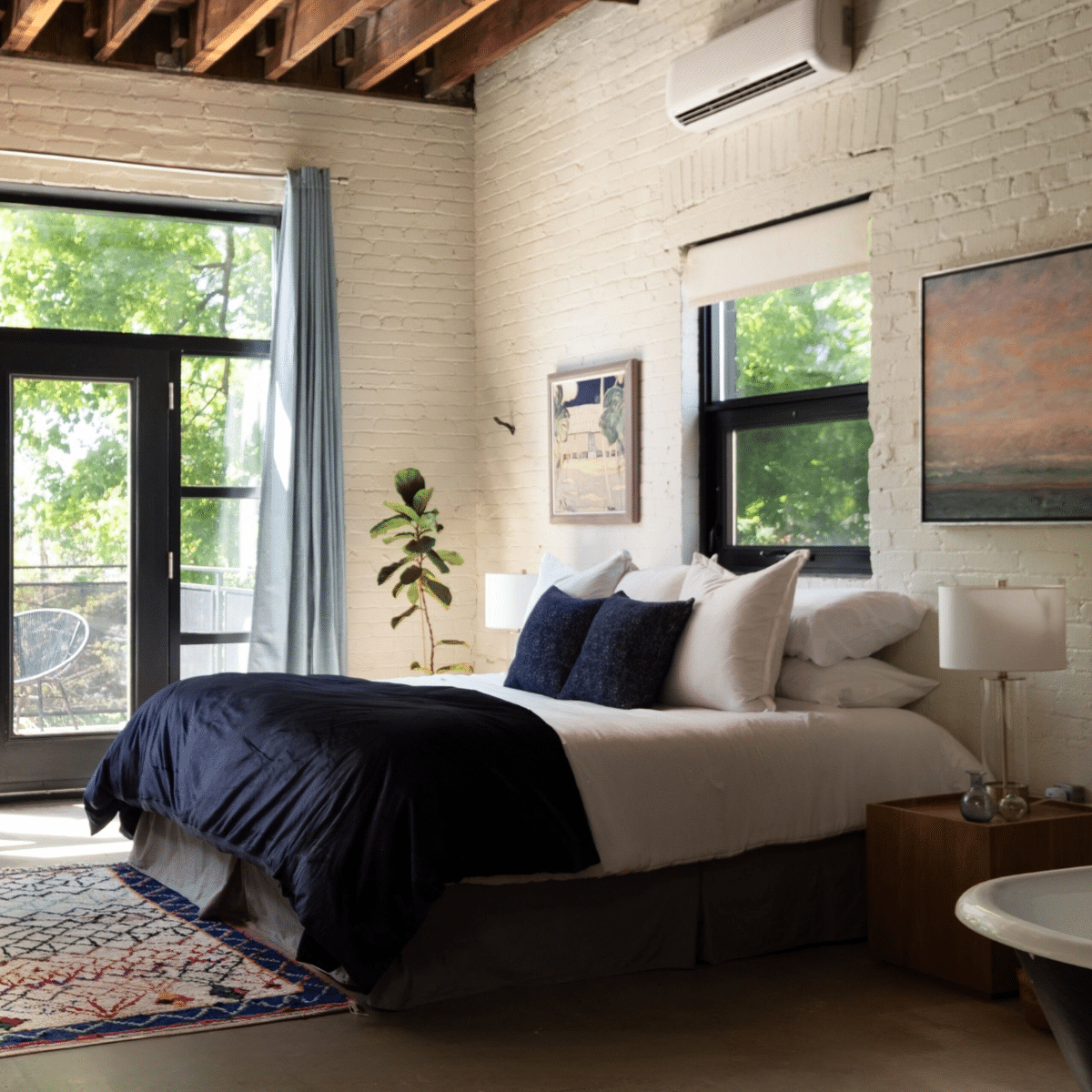 Roncesvalles Loft bedroom staged with nightstands and lamps