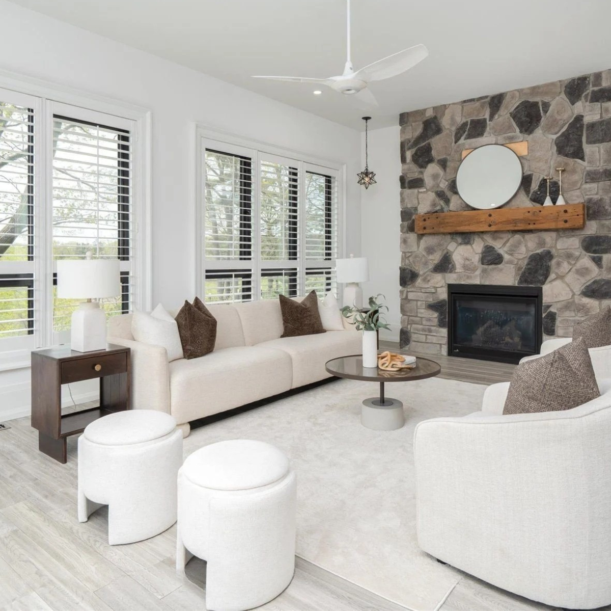 Rouge River waterfront family room styled with coffee table