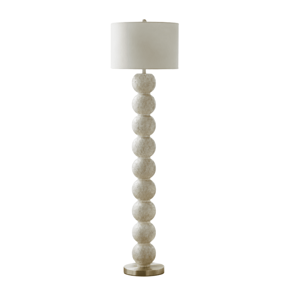 Modern floor lamp with neutral bubble base and brushed metal accents for staged interiors